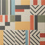 Bold geometric tiles in warm and cool tones, featuring chevrons, stripes, and blocks of color for a playful modern statement.