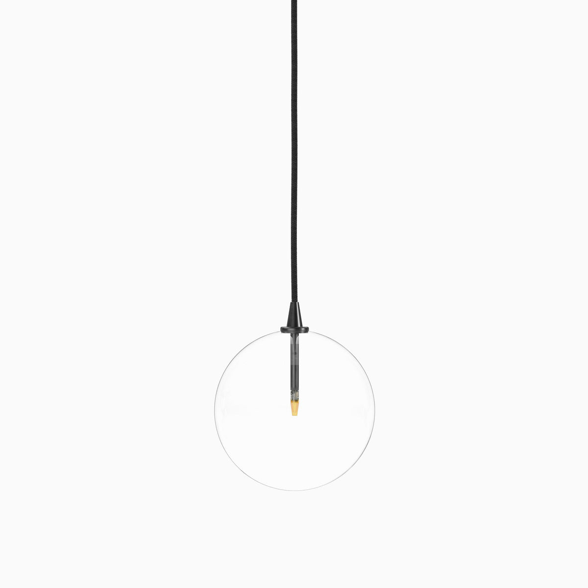 Minimalist pendant light with a clear glass globe, suspended by a black gunmetal cord and featuring a slim black and brass vertical socket.