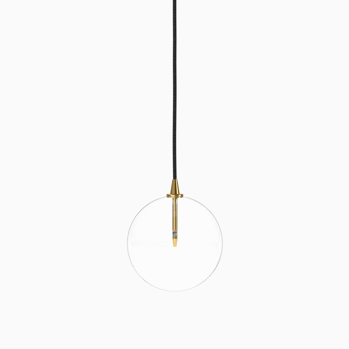 Modern pendant light with a clear glass globe, suspended by a black cord and featuring a slender vertical socket in burnished brass.