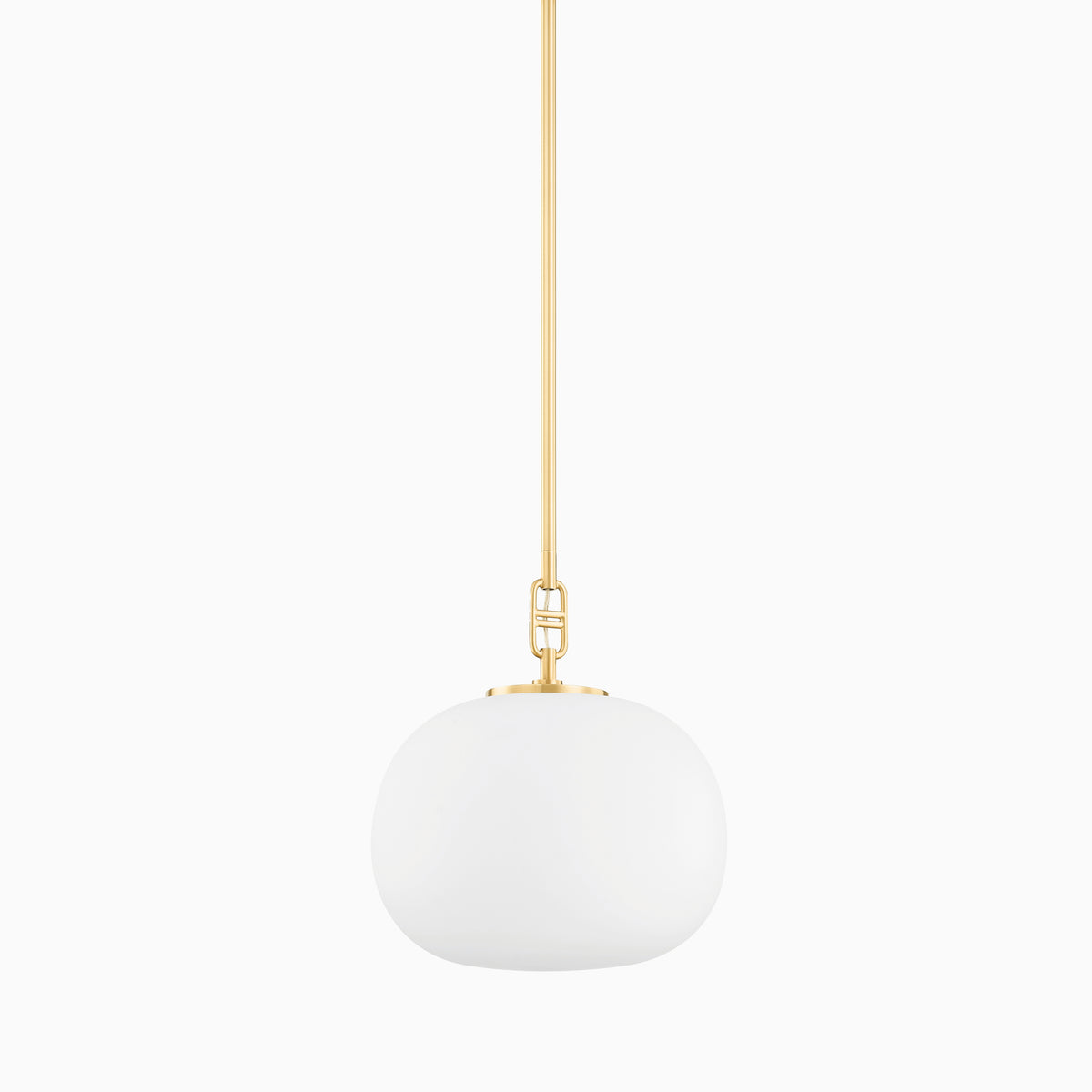 Our Kaley 11” Pendant in Aged Brass features a frosted elliptical glass shade and slender suspension stem, offering soft, elegant lighting overhead.