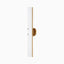 Patina brass wall sconce with slim vertical design, frosted white diffuser, and rounded backplate for a modern minimalist look.