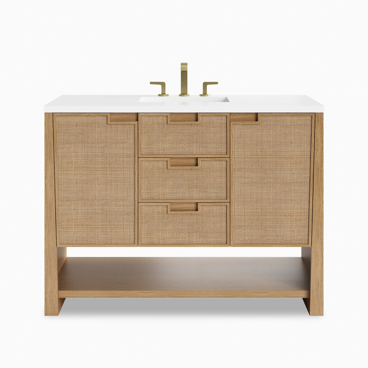 48 inch oak single bathroom vanity with woven cane cabinet fronts, white stone countertop, brass faucet, and open shelf storage.