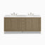 A 72 inch double bathroom vanity in Walnut Whisper with natural brown wood cabinetry, framed panel doors, stacked center drawers, and a White Zeus Silestone top with two sinks.