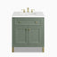 A compact 30 inch single vanity in Smokey Celadon with muted green cabinetry, framed panel doors, a spacious top drawer, brass hardware, and a White Zeus Silestone countertop.