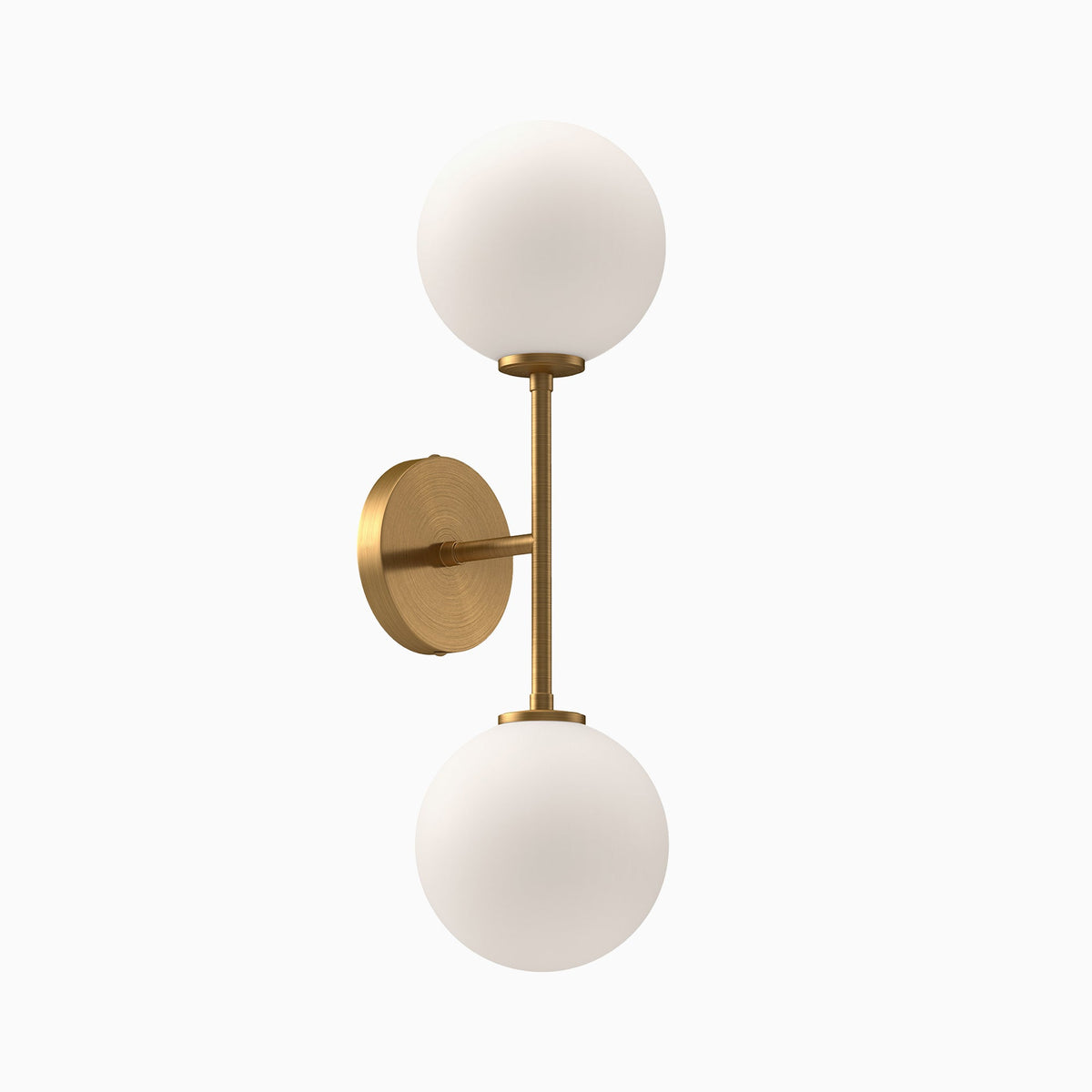 Modern wall sconce with dual frosted glass globe shades and brushed brass vertical arm and round backplate.