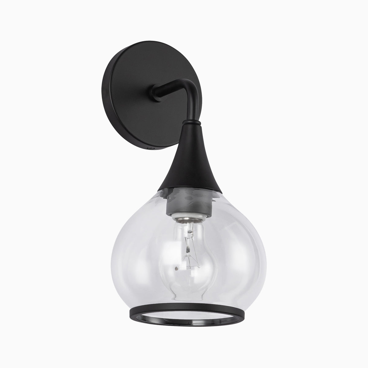 Matte black wall sconce with curved arm and round backplate, featuring a clear glass shade and exposed bulb.