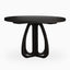 Round black wood dining table with a slim tabletop and sculptural curved pedestal base, featuring open detailing for a refined modern look.
