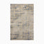 Power loomed area rug from Egypt made of polypropylene with a distressed beige and blue abstract pattern, adding a traditional touch to any space.