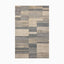 Power loomed area rug from Egypt made of polypropylene with an abstract geometric pattern in neutral beige, gray, and blue tones.