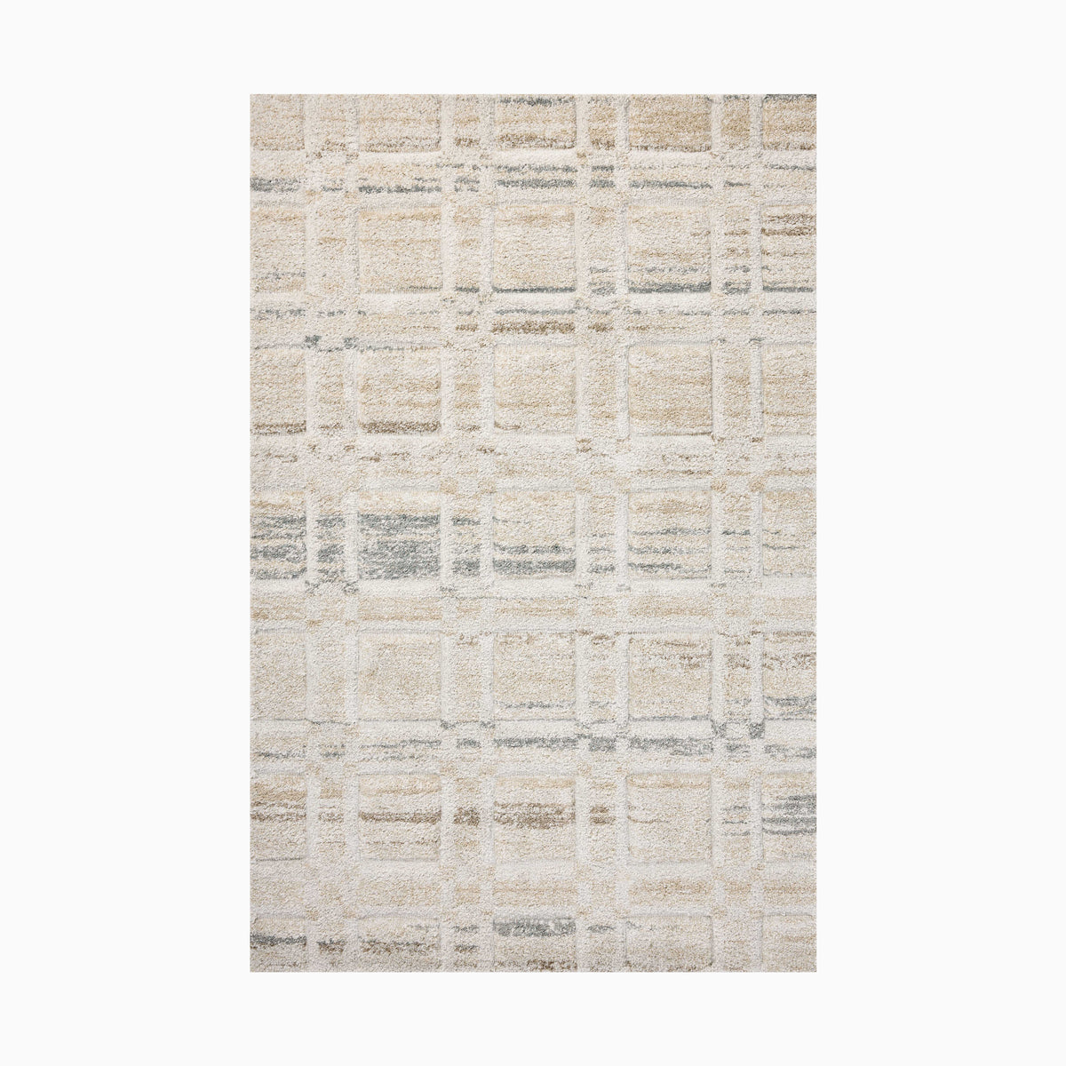 Power loomed area rug from Egypt made of polypropylene with a textured grid pattern in soft beige, ivory, and gray tones.