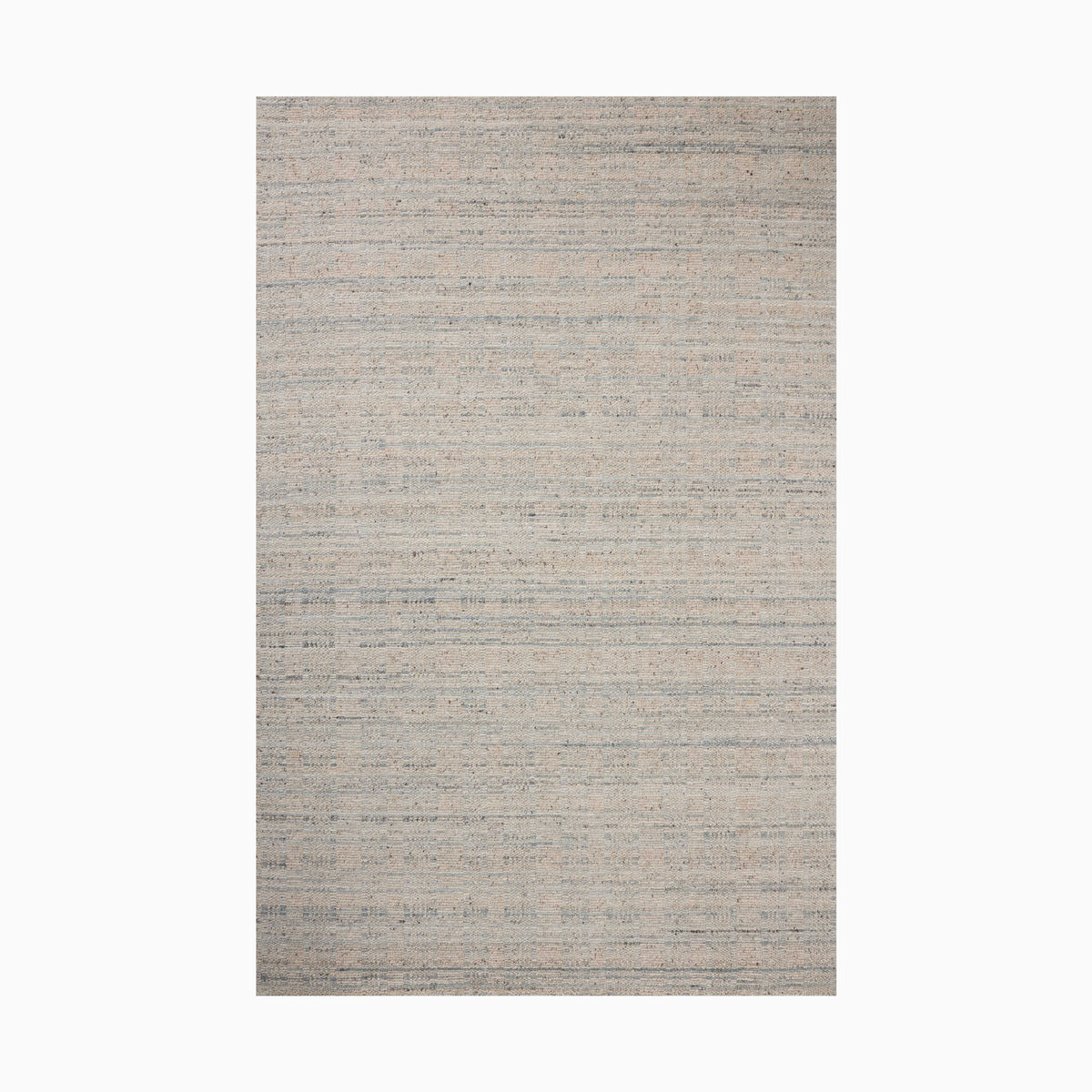 Soft beige hand loomed rug made of nylon and wool with subtle blue-gray undertones and a woven fabric-like texture, perfect for a serene, organic aesthetic.