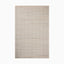 Textured beige hand loomed rug made of nylon and wool with a subtle woven pattern, creating a natural, fabric-like appearance. Perfect for warm, organic interiors.
