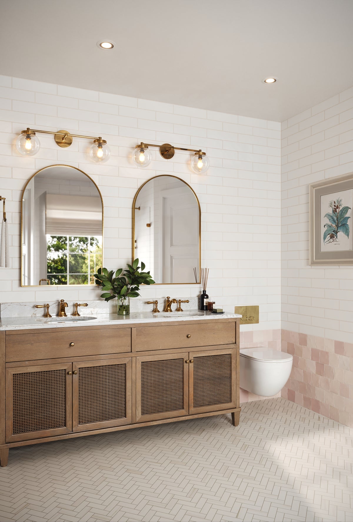 Bright bathroom featuring Madilyn Pearl 3x12 matte tiles on the wall, with a natural wood vanity, gold fixtures, and soft pink accents.