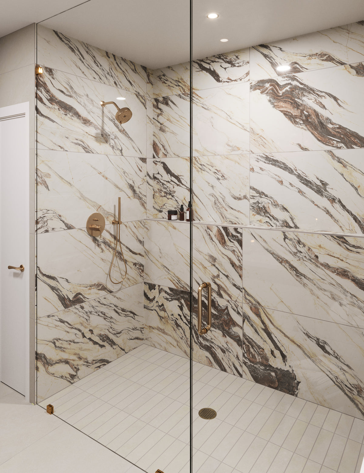Close-up of a luxurious shower showcasing marble-patterned tiles with gold veining, complemented by sleek gold fixtures and a glass enclosure.