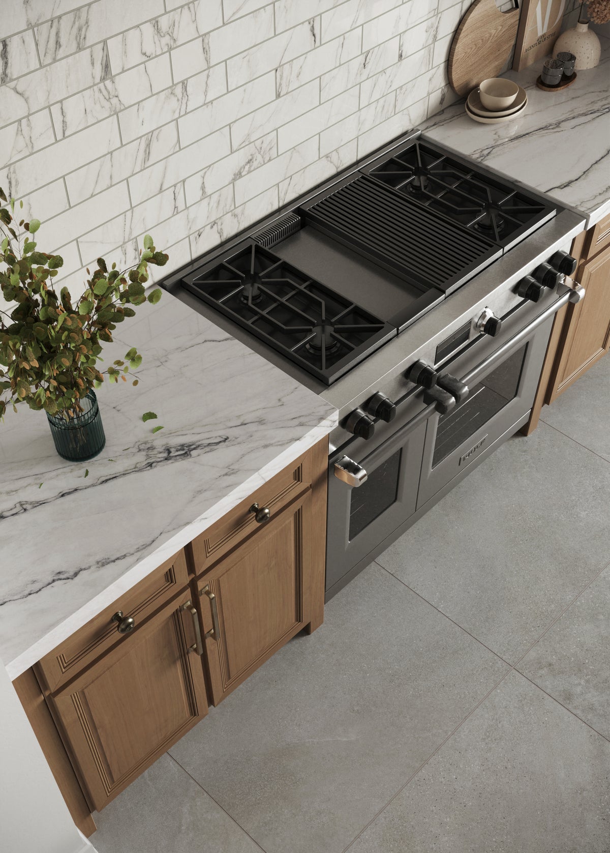 Overhead view of a kitchen with wooden cabinets, marble backsplash, stainless steel oven, and Shea 32x32 Matte Porcelain Tile in Smoke flooring.