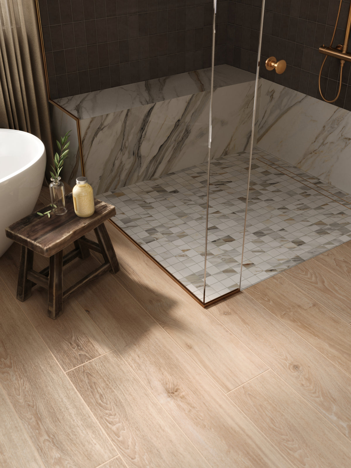 A close-up of a sophisticated bathroom featuring espresso shower tiles, marble look bench accents, mosaic floor tiles, and warm wood-look flooring for a modern, elegant touch.