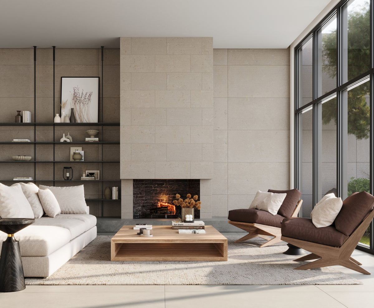 Warm and inviting living room featuring light dune-beige 12x24 chiseled porcelain tiles, a cozy fireplace, and modern furniture with earthy tones, surrounded by natural light streaming through large windows.