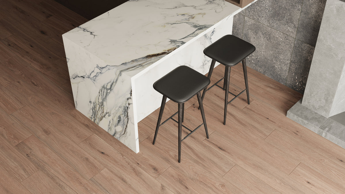 Elegant kitchen design featuring Preston's 8x48 matte porcelain tiles in Chestnut, paired with marble counter accents for a modern, natural charm.