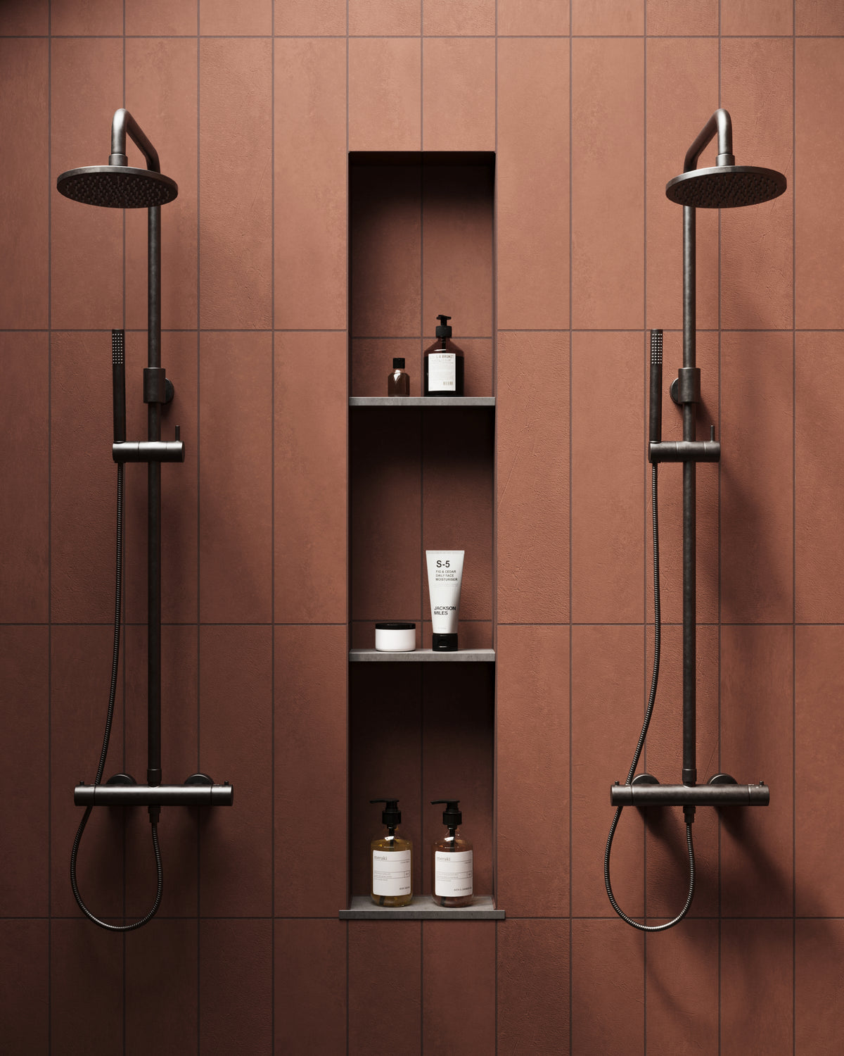 A modern shower featuring Dax Rust 6x24 matte porcelain tiles, paired with sleek black fixtures and a recessed shelving unit.