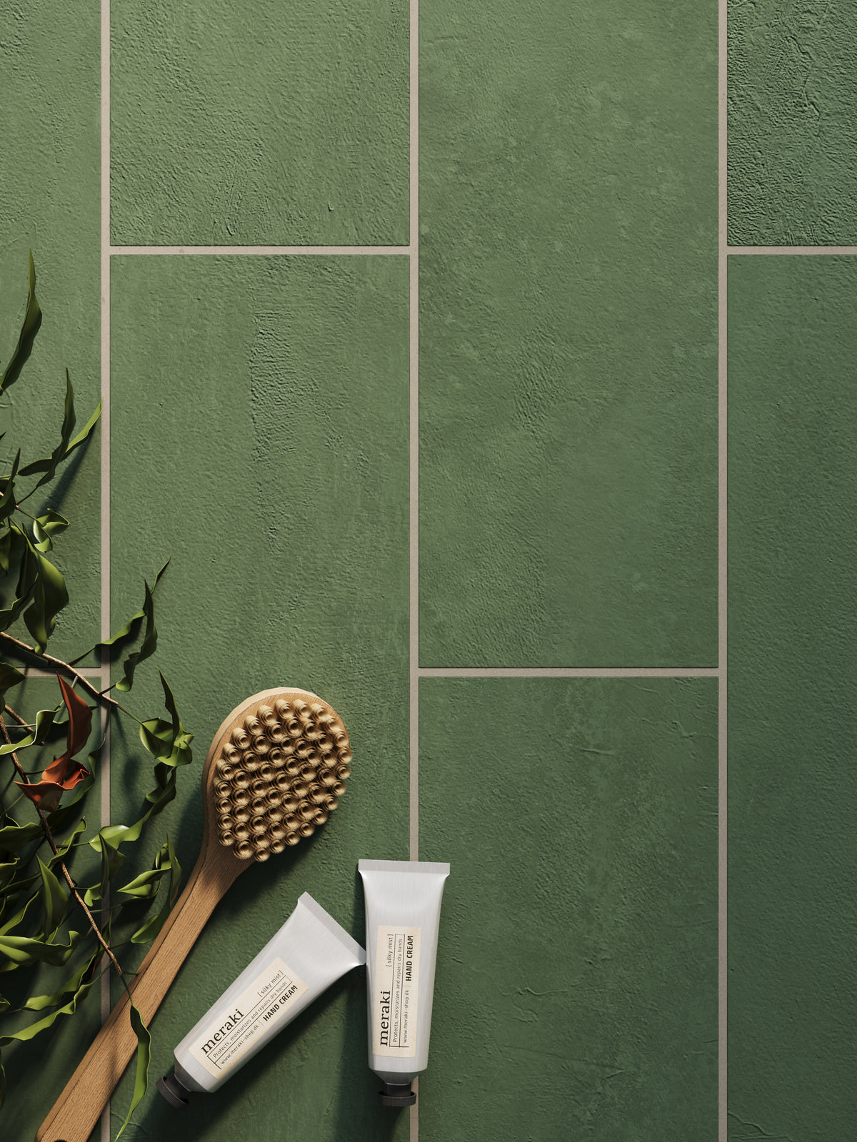 Dax Forest 6x24 matte porcelain tiles, featuring a deep green tone and textured surface, paired with natural bath essentials for a calming aesthetic. 