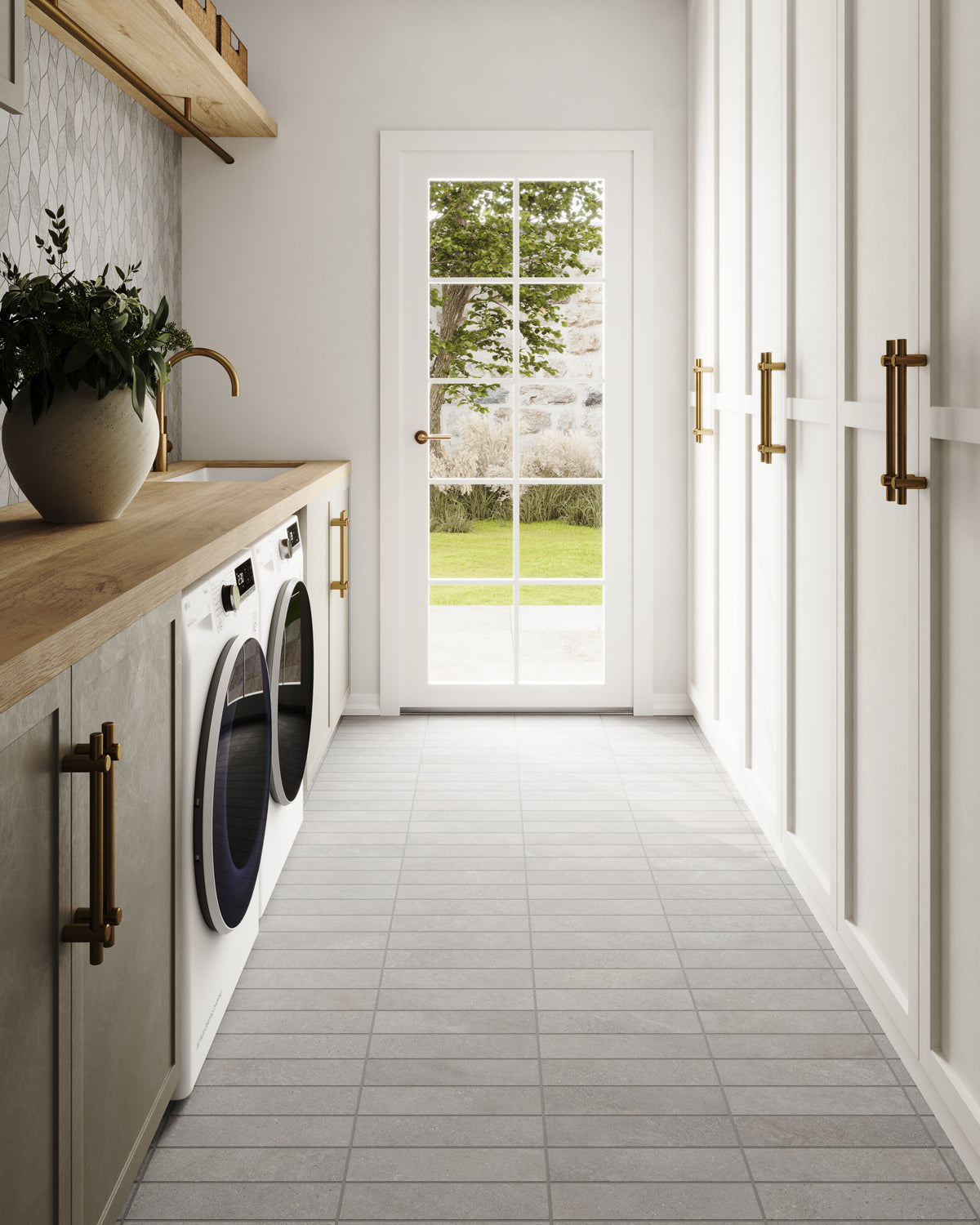 Laundry room with Shea 3x12 Matte Porcelain Tile in Stone, adding a modern and clean aesthetic to the space.