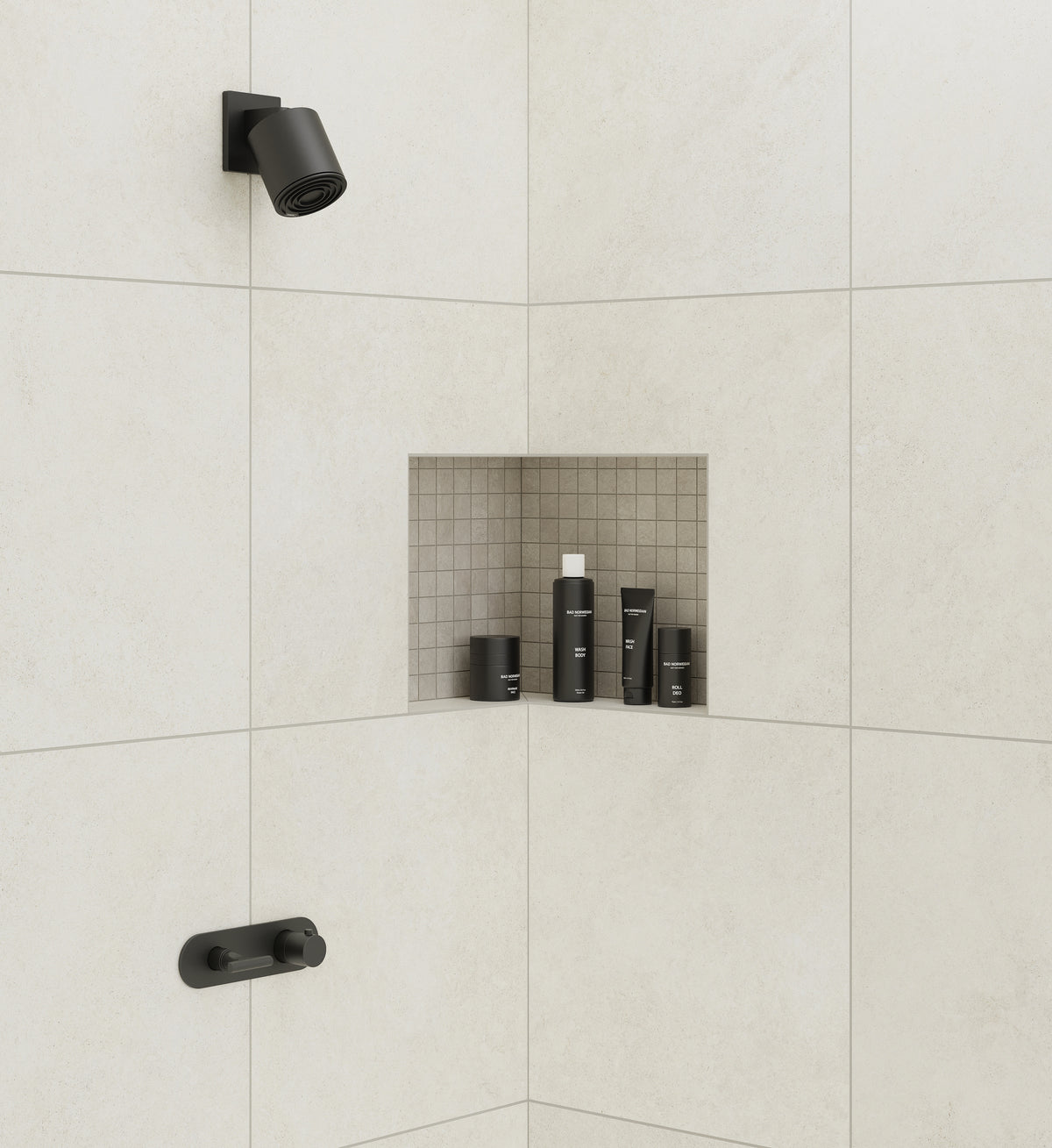 Shower space featuring the Atelier White Sand tiles with a matte finish, paired with a recessed shelf showcasing sleek black toiletries.