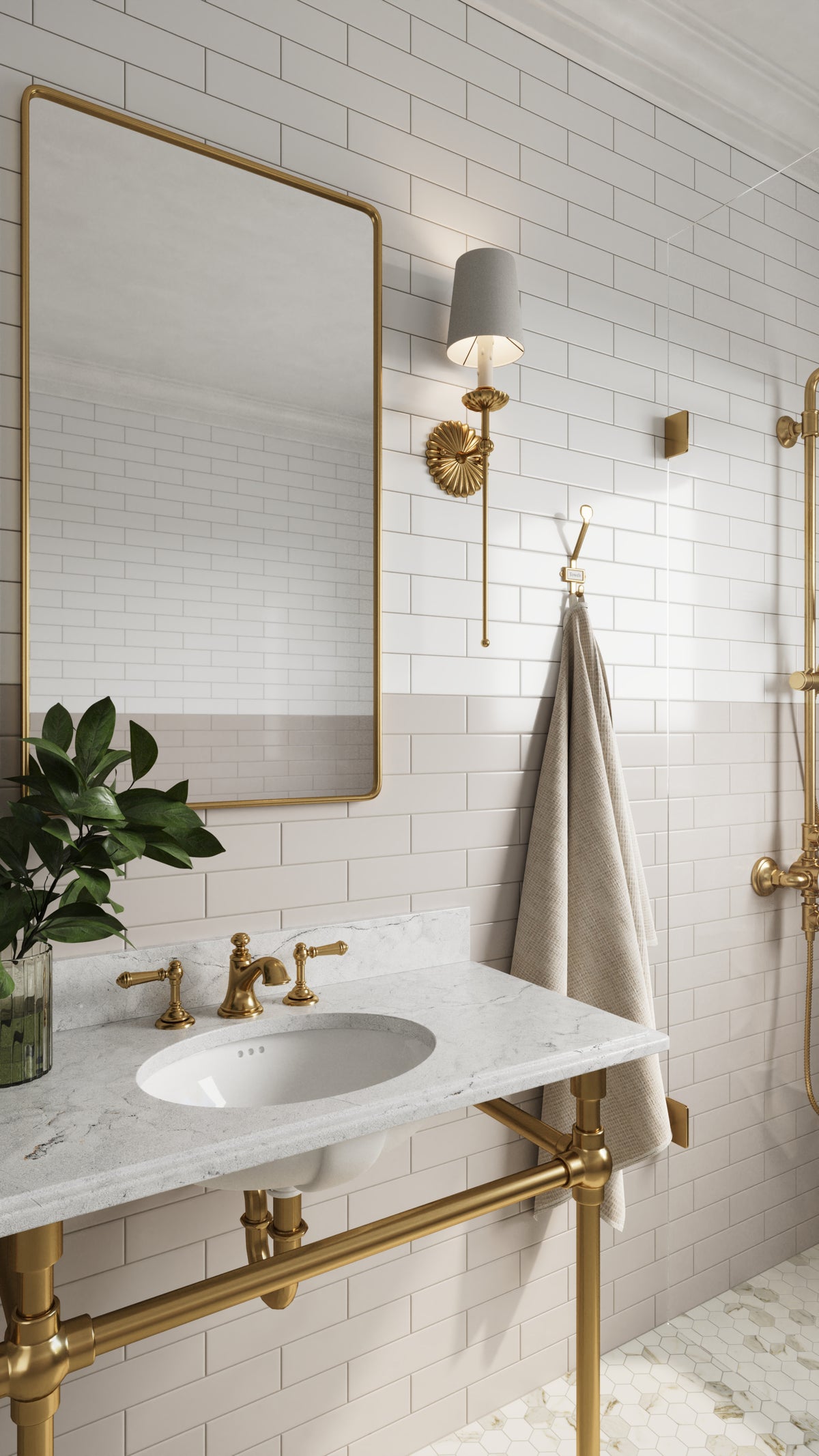 Elegant bathroom featuring Polly Beige 3x10 satin ceramic tiles, complemented by luxurious brass fixtures and a sleek marble vanity for a timeless aesthetic.