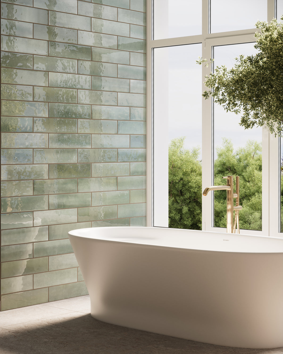 A serene bathroom with glossy green subway tiles, a freestanding white tub, and large windows framing lush greenery, creating a spa-like ambiance.