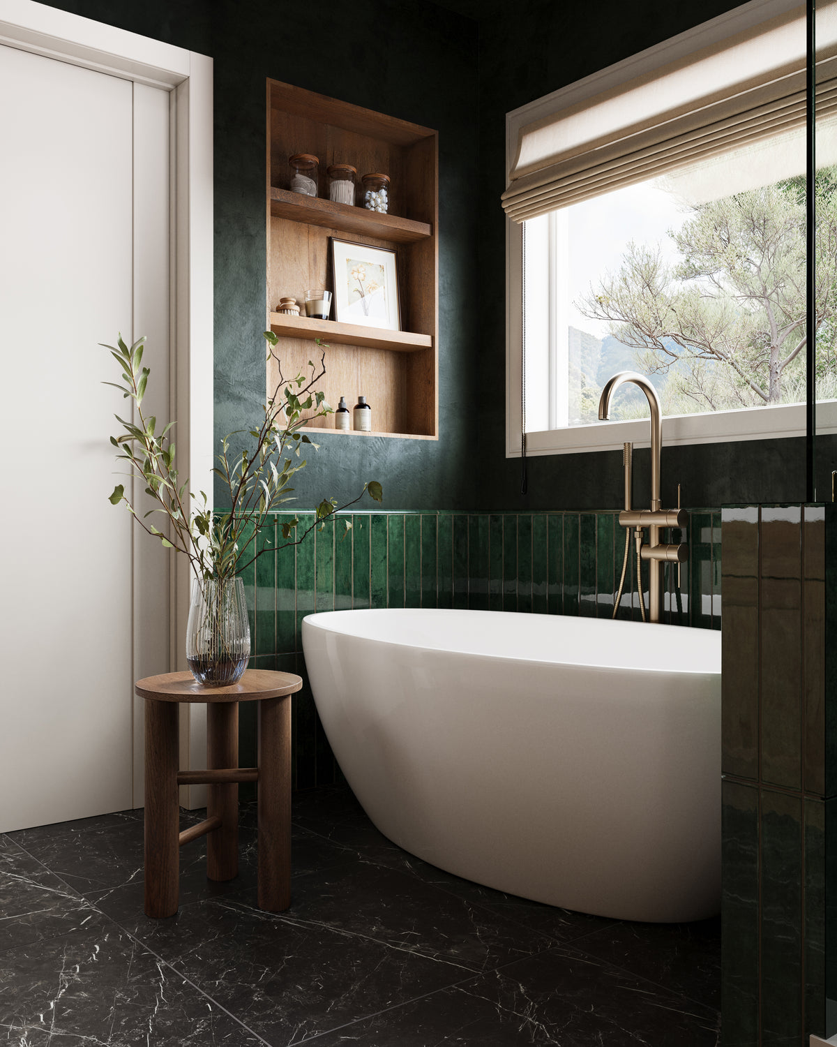 Luxurious bathroom featuring Jaden Hunter 0.75x16 pencil tiles in a rich green gloss, paired with dark marble flooring and a freestanding white bathtub for a serene, upscale design.