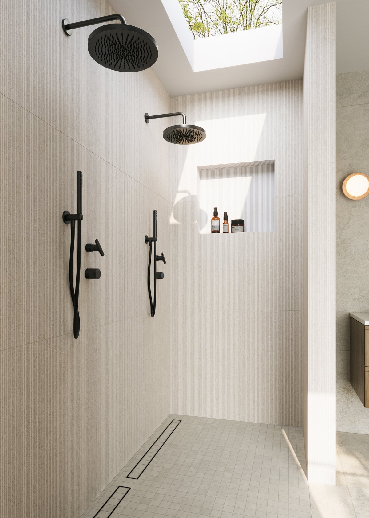 Modern shower with dual black rain showerheads, beige vertical tile walls, and a skylight providing natural light.
