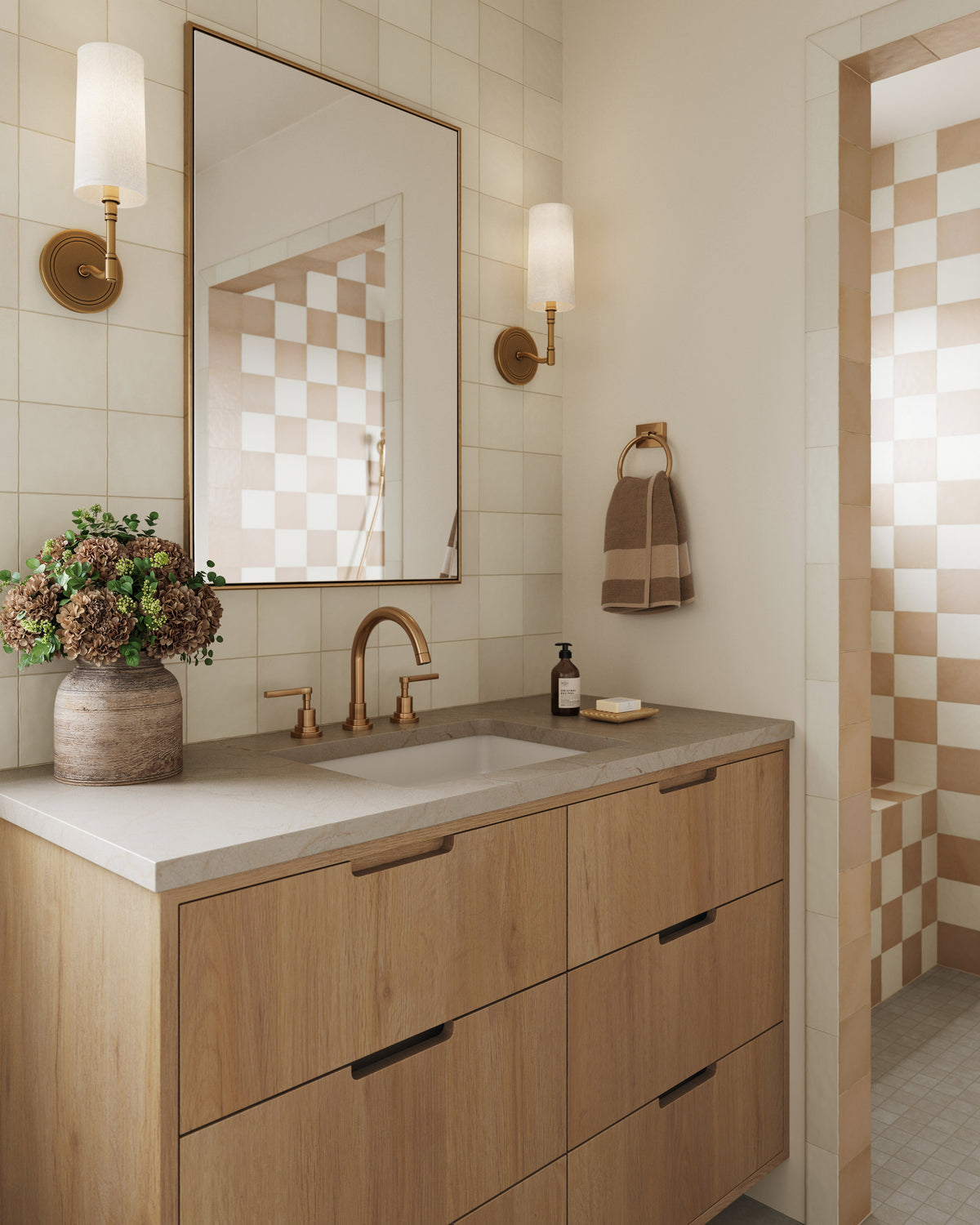 Elegant bathroom with Ellie white matte 5x5 tiles adorning the walls, paired with warm brass fixtures and natural wood cabinetry