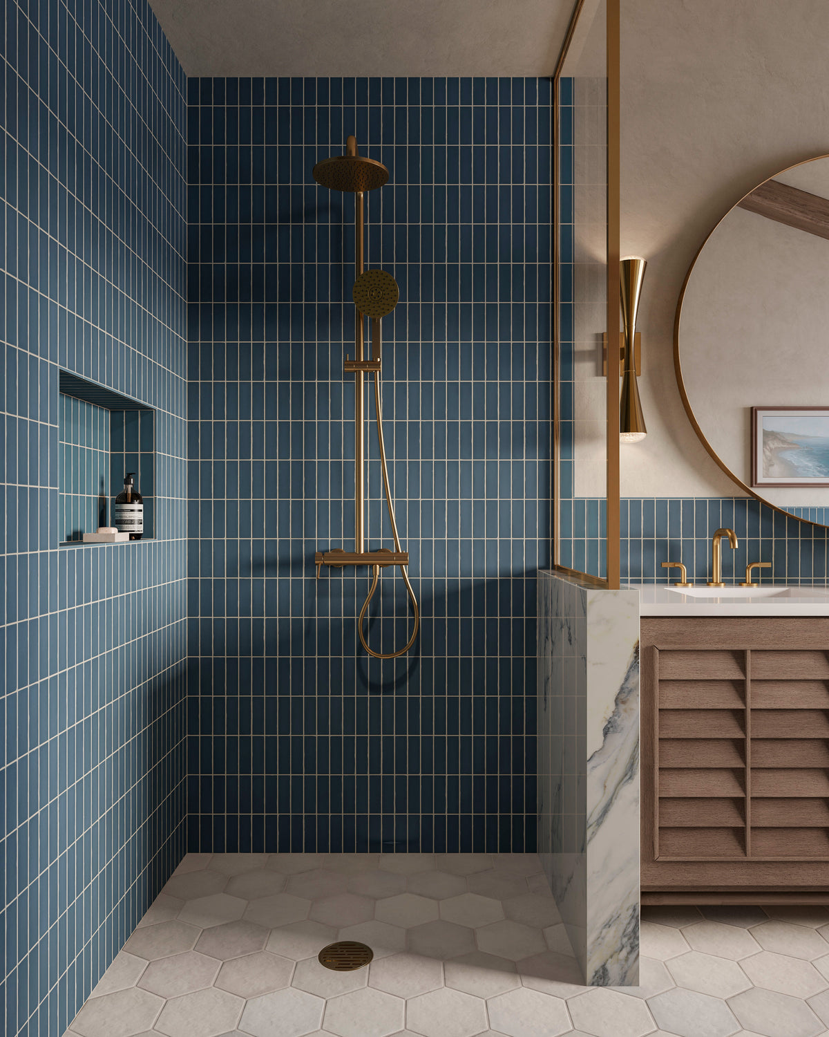 Modern shower with navy blue subway tiles, 0.3x5 right-angle trim outlining the niche, brass fixtures, and hexagon tile flooring.