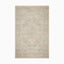Hand-woven cotton blend rug in soft natural beige with opal blue accents, featuring an intricate transitional pattern for a refined look.