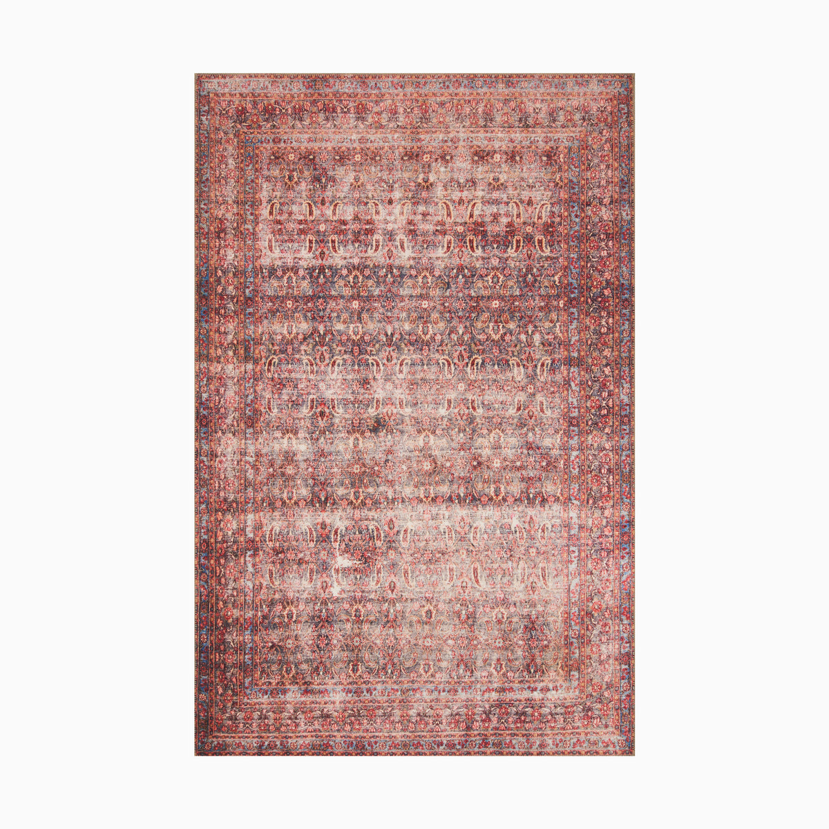 Durable power-loomed polyester rug in scarlet red and navy blue, featuring an intricate transitional medallion pattern for timeless appeal.