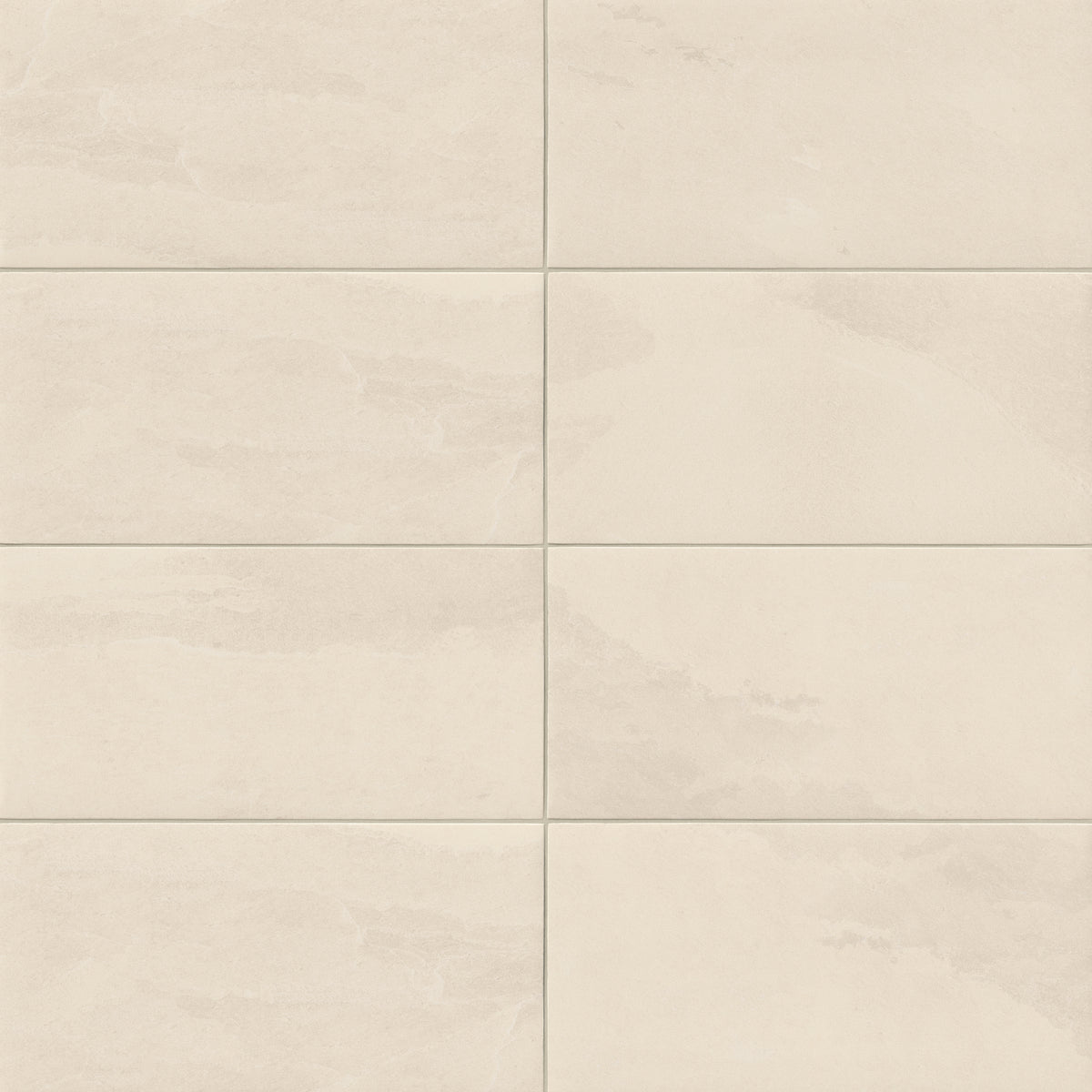Matte rectangular tile in beige tones with subtle stone-inspired veining, perfect for bright, inviting interiors in kitchens, bathrooms, or open living areas.