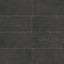 Rectangular porcelain tile with a fluted surface featuring linear grooves and a lightly textured finish, showcasing a dark gray color with subtle tonal variation and natural shading.