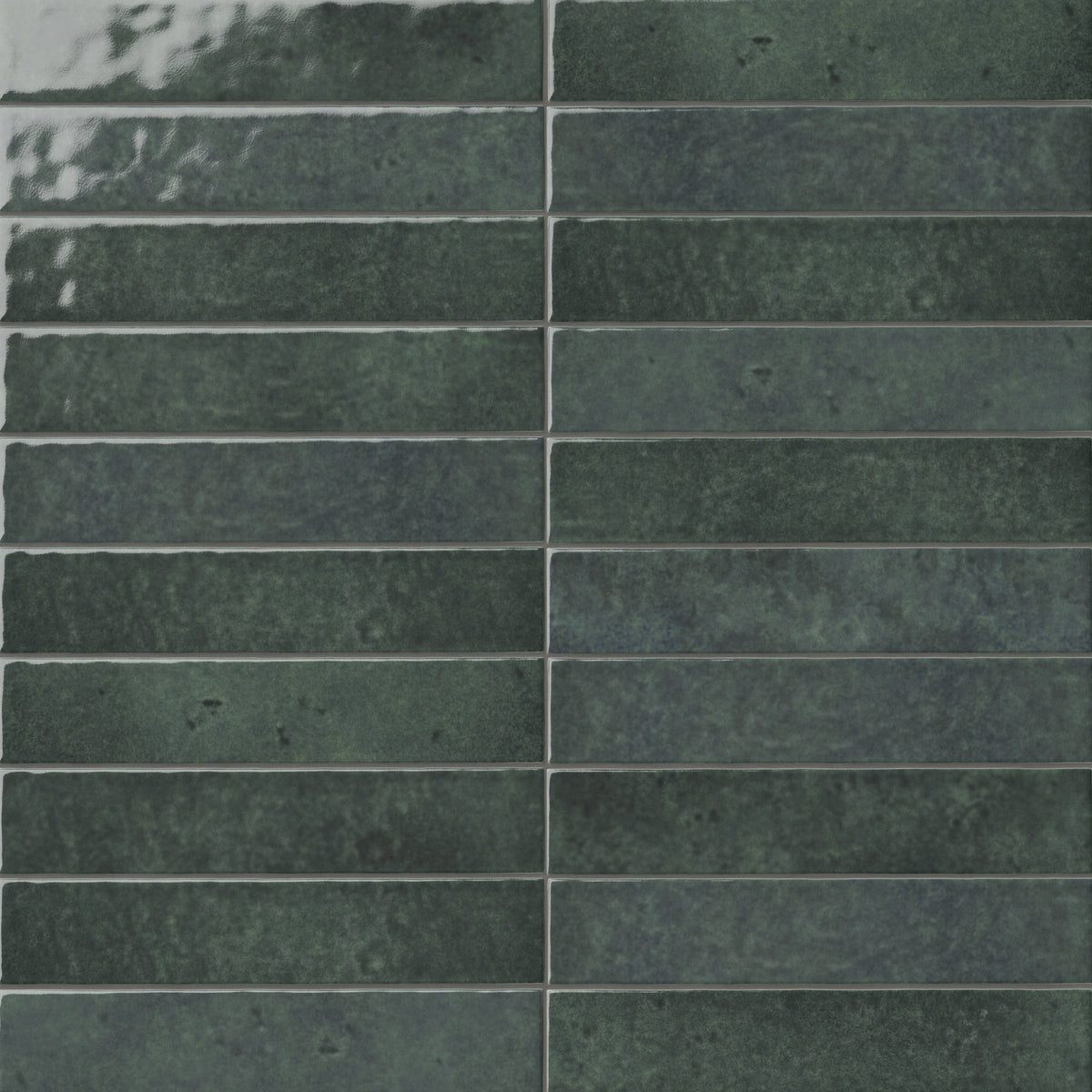 Glossy black 2x13 ceramic wall tiles installed in a horizontal stack pattern, featuring rich tonal variation, softly irregular edges, and a handcrafted glazed finish.