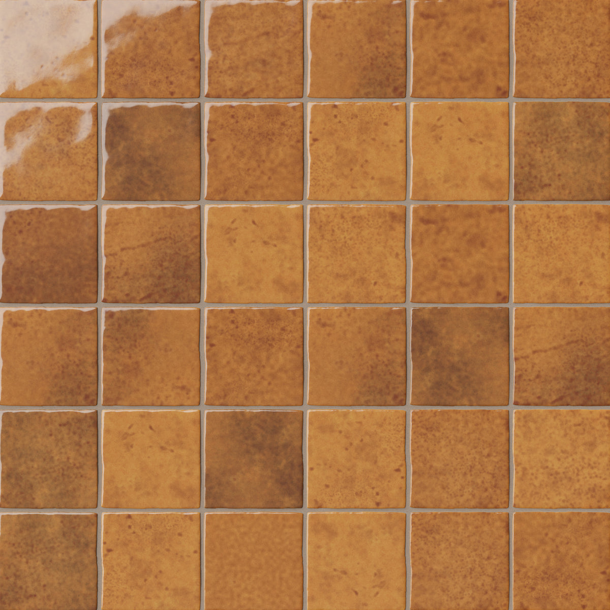 Grid of brown ceramic wall tiles showcasing rich earthy tones, a lustrous glazed finish, and subtle color movement across each 4x4 tile.