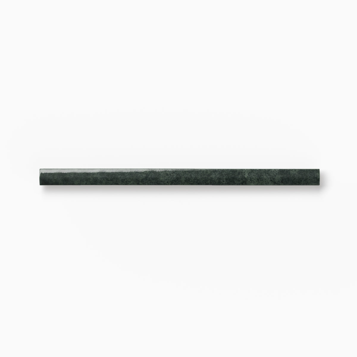 Slim dark green ceramic rounded edge trim with rich organic shading, soft surface movement, and a gently curved profile on a white background.