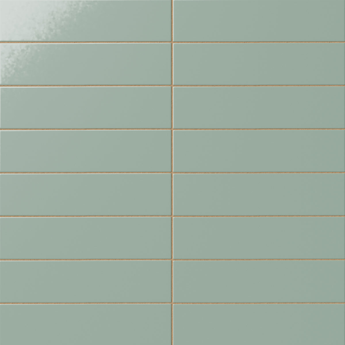 Glossy subway tile in a pale sage green tone with a flat rectangular design, soft reflective glaze, muted green coloring, and warm linear grout contrast.