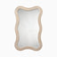 Evella Mirror in Cream with gently curved bamboo frame, fine grooved texture, and warm beige finish for a light, organic modern look.