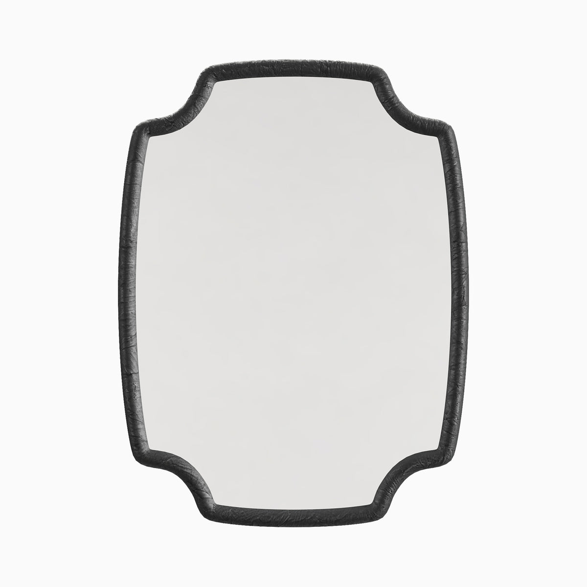 Quatrefoil-style wall mirror with a textured charcoal resin frame, combining classic form with rich detailing and modern appeal.