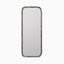 Elongated rounded rectangular mirror with a classic silhouette, framed by a narrow border in a rustic, light metallic sheen.
