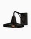 Black outdoor wall sconce with a rectangular backplate, angled arm, umbrella-style shade, exposed bulb, and variegated dark finish inspired by modern farmhouse and Americana design.