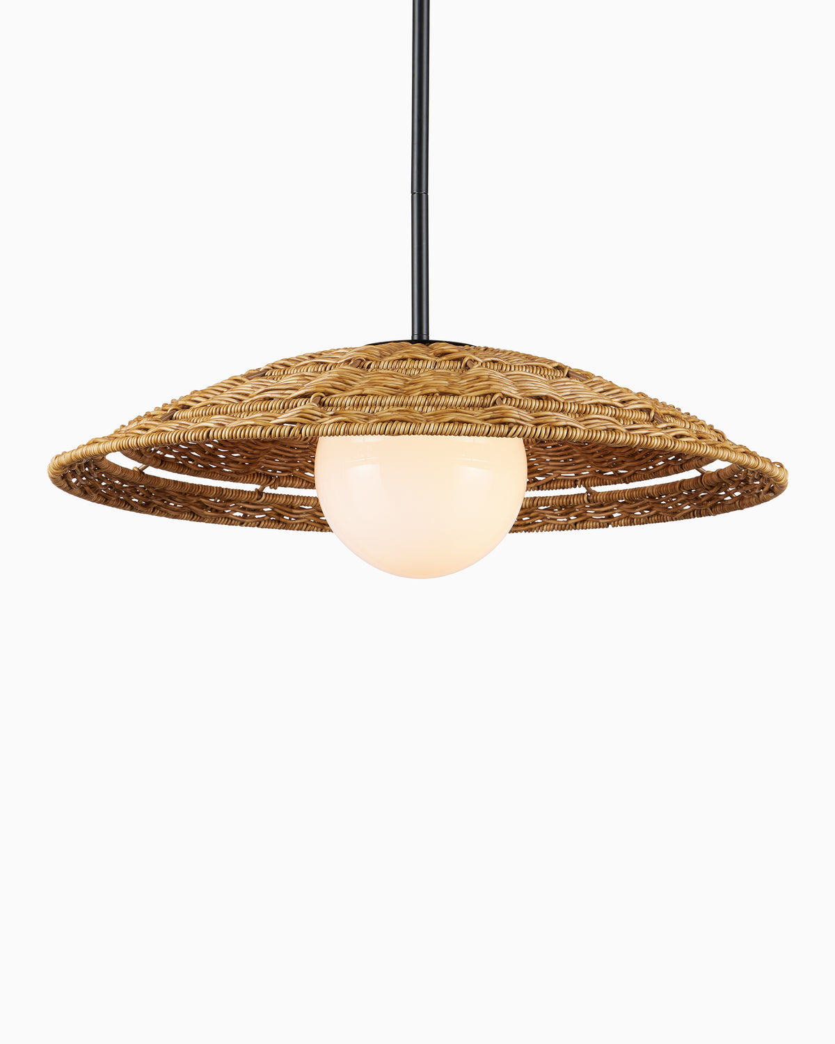 Suspended from a thin black rod, our Rivington Outdoor Pendant Small features a compact honey brown wicker dish shade with a soft white milk glass center light.