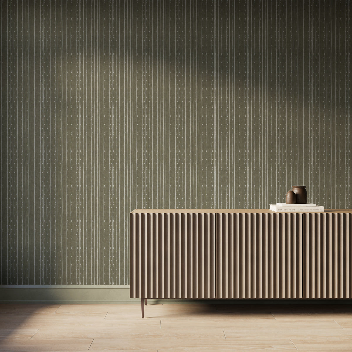 Olive green textured wallpaper with vertical dashed stripe pattern, styled with a modern fluted wood console.