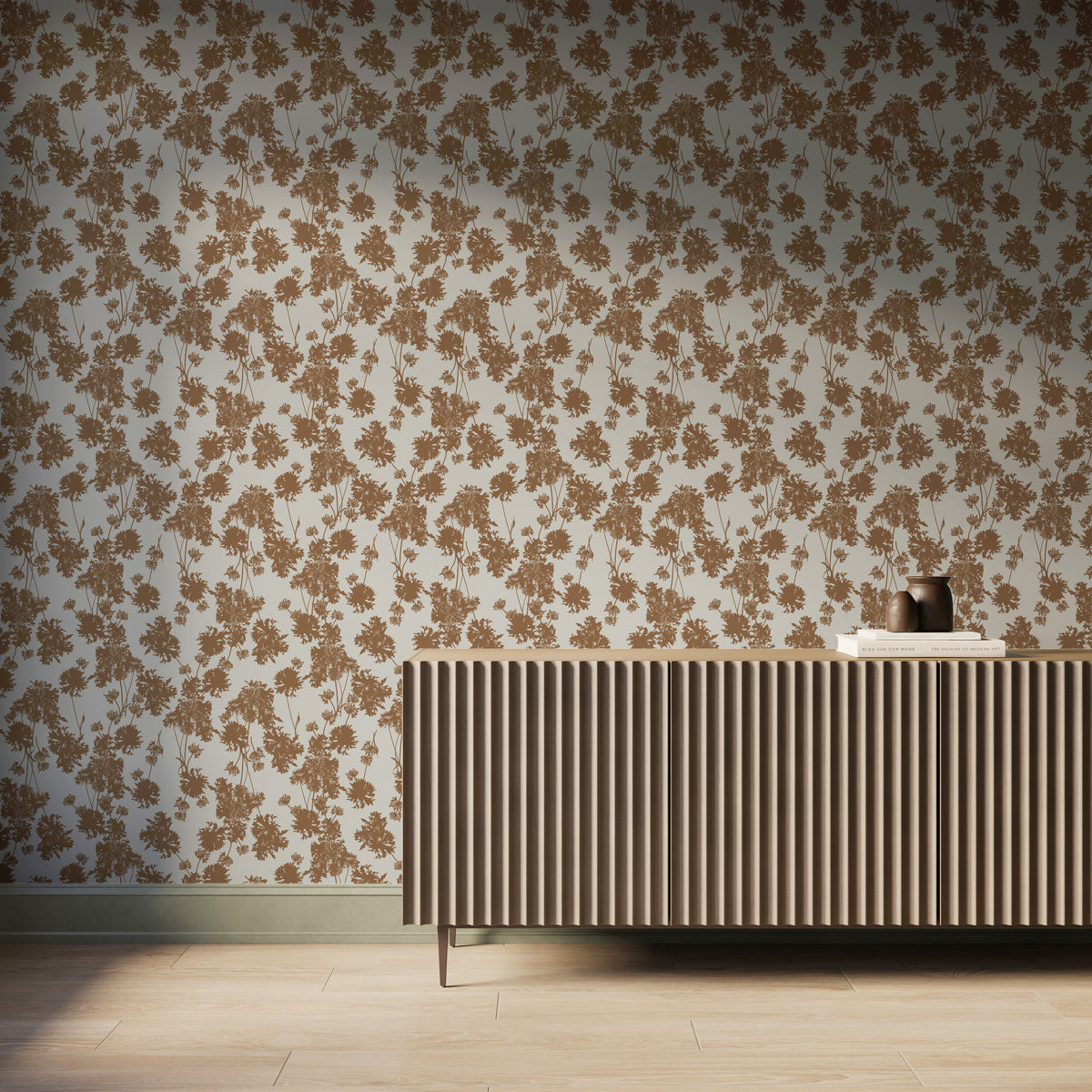 Brown botanical wallpaper behind a modern ribbed wood sideboard with books and pottery in a warm, nature-inspired interior.