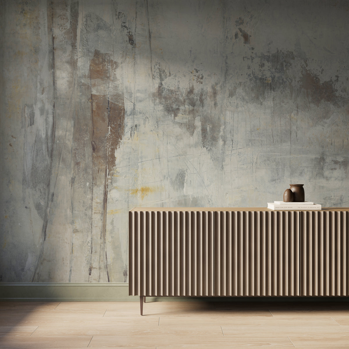 Modern interior featuring the Skyveil Mural in Mistfall VI with layered off-white and earthy gray abstract textures, styled behind a fluted wood console cabinet with light wood flooring and soft natural light casting across the wall.
