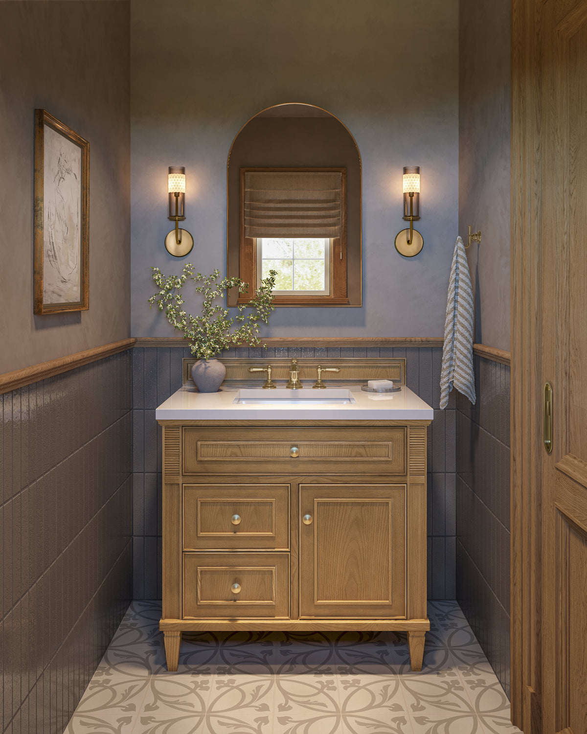 Elodie 36-inch single vanity in light natural oak with White Zeus quartz countertop, styled with a brass faucet, arched mirror, wall sconces, and warm bathroom accents.